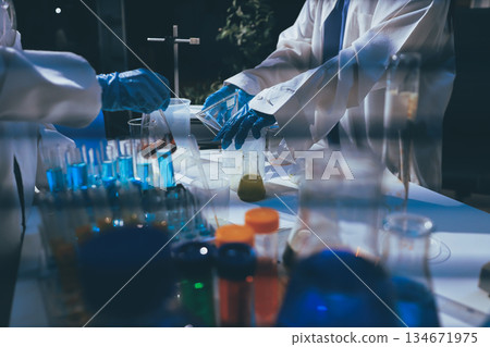 Researchers working in the clinical laboratory Researchers working in the clinical laboratory 134671975