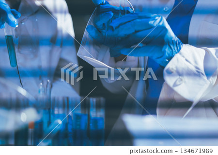 Researchers working in the clinical laboratory 134671989