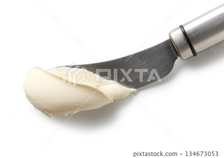 fresh cream cheese on knife fresh cream cheese on knife 134673053