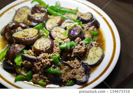 Eggplant and pepper stir fry 134673358