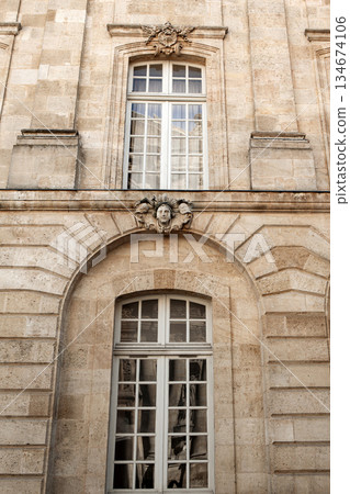 Stone facade of an old building 134674106