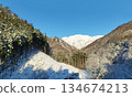 Snow-covered Mount Tanigawa on a winter morning 134674213