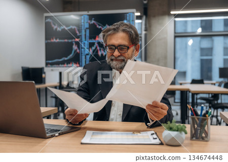 Senior man is in the modern office 134674448