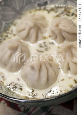 Traditional Georgian dish khinkali - Hinkali - Boiled khinkali with lamb or beef or cheese Traditional Georgian dish khinkali - Hinkali - Boiled khinkali with lamb or beef or cheese 134675184