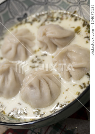 Traditional Georgian dish khinkali - Hinkali - Boiled khinkali with lamb or beef or cheese Traditional Georgian dish khinkali - Hinkali - Boiled khinkali with lamb or beef or cheese 134675185