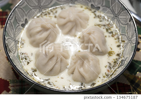 Traditional Georgian dish khinkali - Hinkali - Boiled khinkali with lamb or beef or cheese Traditional Georgian dish khinkali - Hinkali - Boiled khinkali with lamb or beef or cheese 134675187