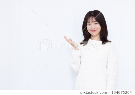A woman giving a smile 134675204