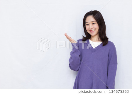 A woman giving a smile 134675263