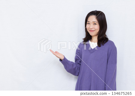 A woman giving a smile A woman giving a smile 134675265