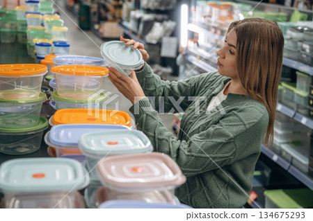 Food trays. Woman is in the hardware store, shopping conception 134675293