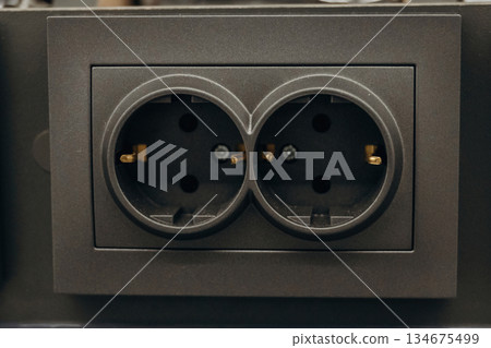 Overhead sockets in the hardware shop, on the wall 134675499