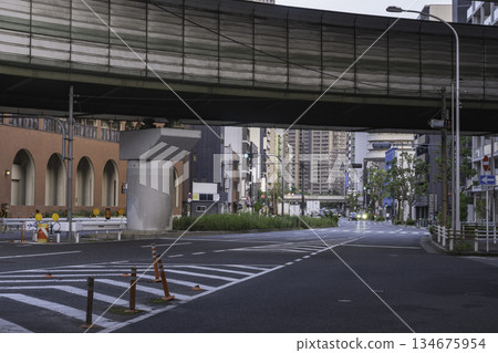 Urban intersection under the overpass, industrial cityscape Urban intersection under the overpass, industrial cityscape 134675954
