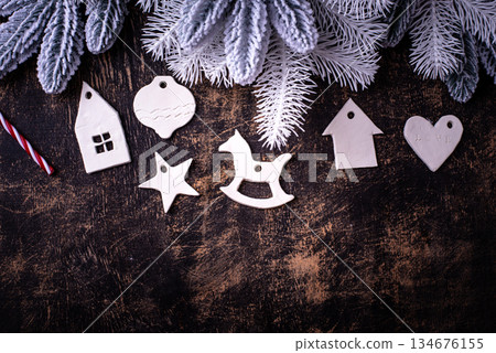 Handmade Christmas tree decorations from clay Handmade Christmas tree decorations from clay 134676155