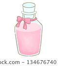 A cute glass bottle with a ribbon 134676740