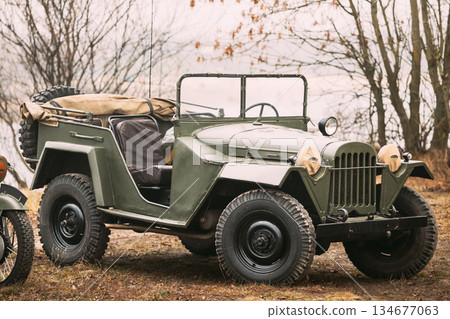 Willys Mb (jeep, U.s. Army Truck, 4x4) Of Us Army Forces Of World War 2 Time Standing Parked At Forest During Reconstruction Of Some Fight World War II 134677063