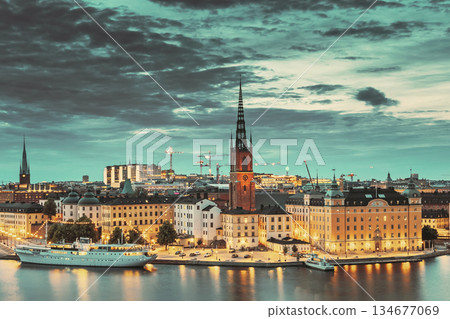 Stockholm, Sweden. Scenic View Of Stockholm Skyline At Summer Evening. Famous Popular Destination Scenic Place In Dusk Lights. Riddarholm Stockholm, Sweden. Scenic View Of Stockholm Skyline At Summer Evening. Famous Popular Destination Scenic Place In Dusk Lights. Riddarholm 134677069