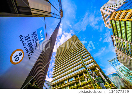 Tokyo cityscape in Japan: Views of Kyobashi Station and the newly opened Daiichi Life Kyobashi Kino Terrace at the Kyobashi intersection. Towards a new era 134677259