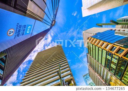 Tokyo cityscape in Japan: Views of Kyobashi Station and the newly opened Daiichi Life Kyobashi Kino Terrace at the Kyobashi intersection. Towards a new era 134677265