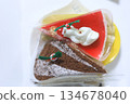 Assorted Christmas cakes including rare cheesecake and zuccotto cake 134678040