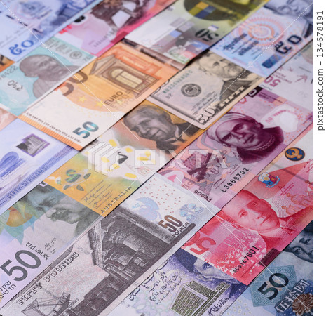 Paper money, banknotes of different countries as a business background. Paper money and cash Paper money, banknotes of different countries as a business background. Paper money and cash 134678191