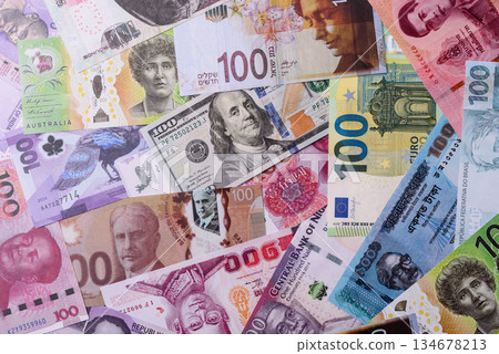 Paper money, banknotes of different countries as a business background. Paper money and cash Paper money, banknotes of different countries as a business background. Paper money and cash 134678213