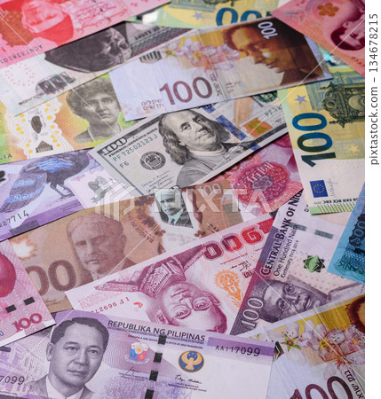Paper money, banknotes of different countries as a business background. Paper money and cash Paper money, banknotes of different countries as a business background. Paper money and cash 134678215