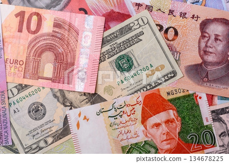 Paper money, banknotes of different countries as a business background. Paper money and cash 134678225