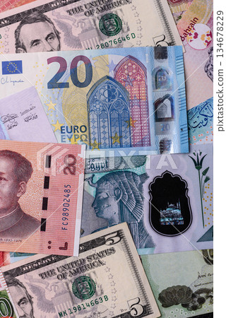 Paper money, banknotes of different countries as a business background. Paper money and cash Paper money, banknotes of different countries as a business background. Paper money and cash 134678229