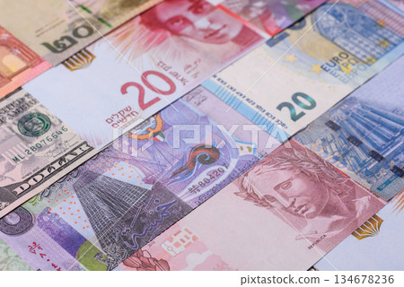 Paper money, banknotes of different countries as a business background. Paper money and cash Paper money, banknotes of different countries as a business background. Paper money and cash 134678236