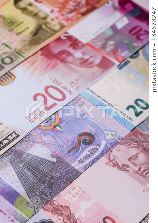 Paper money, banknotes of different countries as a business background. Paper money and cash Paper money, banknotes of different countries as a business background. Paper money and cash 134678247
