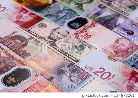 Paper money, banknotes of different countries as a business background. Paper money and cash 134678261