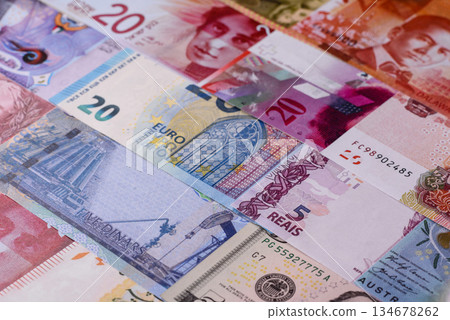 Paper money, banknotes of different countries as a business background. Paper money and cash Paper money, banknotes of different countries as a business background. Paper money and cash 134678262
