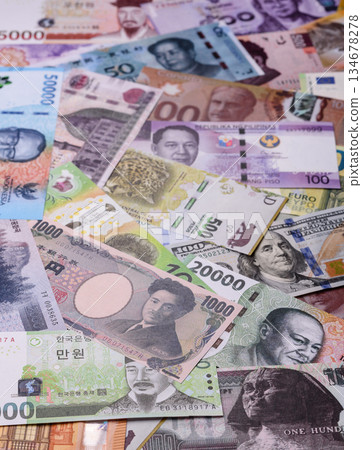 Paper money, banknotes of different countries as a business background. Paper money and cash Paper money, banknotes of different countries as a business background. Paper money and cash 134678278