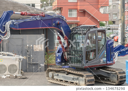 [Store demolition and heavy machinery] 134678298