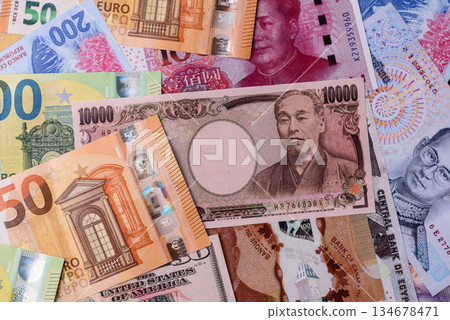 Paper money, banknotes of different countries as a business background. Paper money and cash 134678471