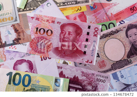 Paper money, banknotes of different countries as a business background. Paper money and cash Paper money, banknotes of different countries as a business background. Paper money and cash 134678472