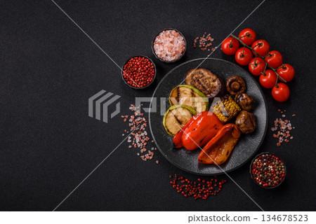 Grilled vegetables, bell peppers, mushrooms, and zucchini, a vegetarian meal. Grilled vegetables 134678523