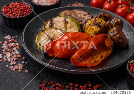 Grilled vegetables, bell peppers, mushrooms, and zucchini, a vegetarian meal. Grilled vegetables Grilled vegetables, bell peppers, mushrooms, and zucchini, a vegetarian meal. Grilled vegetables 134678526