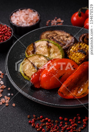 Grilled vegetables, bell peppers, mushrooms, and zucchini, a vegetarian meal. Grilled vegetables 134678529