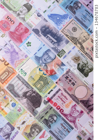 Paper money, banknotes of different countries as a business background. Paper money and cash Paper money, banknotes of different countries as a business background. Paper money and cash 134678783