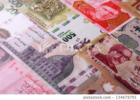 Paper money, banknotes of different countries as a business background. Paper money and cash 134678791