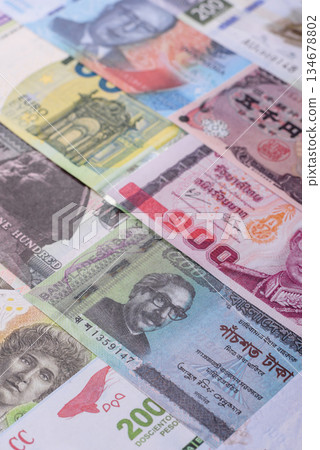 Paper money, banknotes of different countries as a business background. Paper money and cash Paper money, banknotes of different countries as a business background. Paper money and cash 134678802
