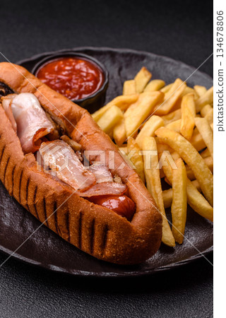 French fries are salty, crispy, and fried in oil, unhealthy takeaway food. French fries 134678806