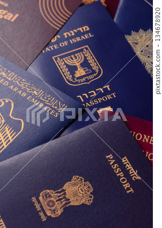 A background of several passports from different countries, an international ID card. Passport A background of several passports from different countries, an international ID card. Passport 134678920