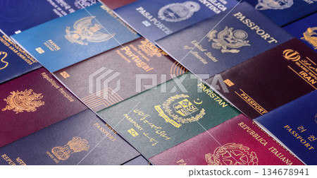 A background of several passports from different countries, an international ID card. Passport A background of several passports from different countries, an international ID card. Passport 134678941