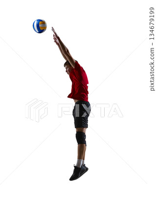 Volleyball player airborne during play isolated on white background. Volleyball player airborne during play isolated on white background. 134679199