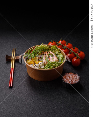A prawn or shrimp bowl with rice, tomatoes, sauce, and vegetables, Asian food. Prawn or shrimp A prawn or shrimp bowl with rice, tomatoes, sauce, and vegetables, Asian food. Prawn or shrimp 134679402