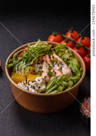 A prawn or shrimp bowl with rice, tomatoes, sauce, and vegetables, Asian food. Prawn or shrimp A prawn or shrimp bowl with rice, tomatoes, sauce, and vegetables, Asian food. Prawn or shrimp 134679405