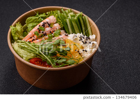 A prawn or shrimp bowl with rice, tomatoes, sauce, and vegetables, Asian food. Prawn or shrimp A prawn or shrimp bowl with rice, tomatoes, sauce, and vegetables, Asian food. Prawn or shrimp 134679406