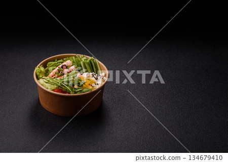 A prawn or shrimp bowl with rice, tomatoes, sauce, and vegetables, Asian food. Prawn or shrimp A prawn or shrimp bowl with rice, tomatoes, sauce, and vegetables, Asian food. Prawn or shrimp 134679410